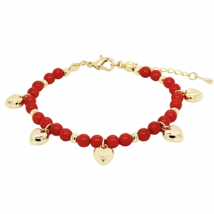 Baby bracelet with red pearl balls and scattered puffed heart charms