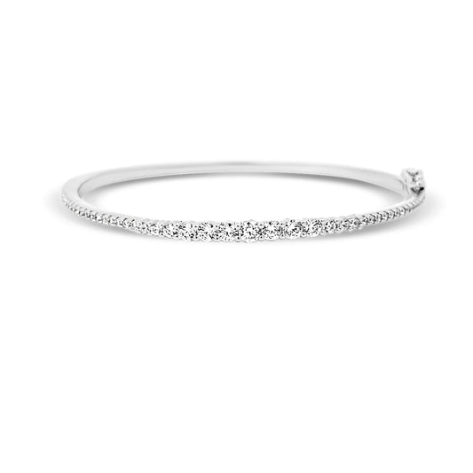 Sterling silver graduated tennis bangle in white gold