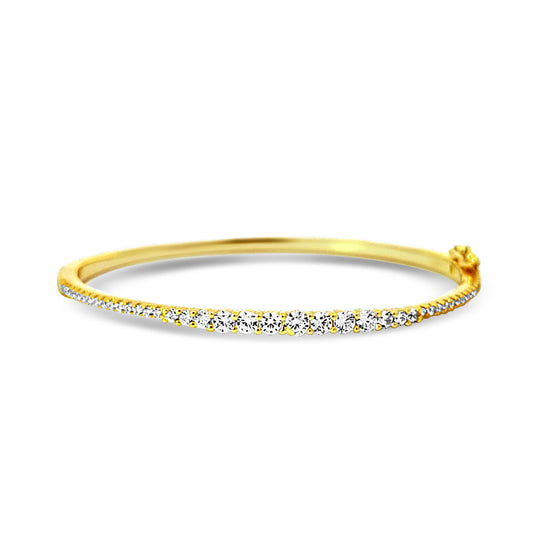 Sterling silver graduated tennis bangle in yellow gold