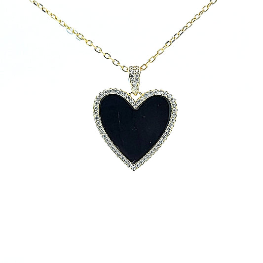 Sterling silver flat heart pendant with black onyx in center