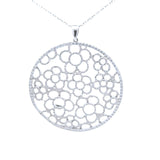 Sterling silver large round pendant with floral design in center