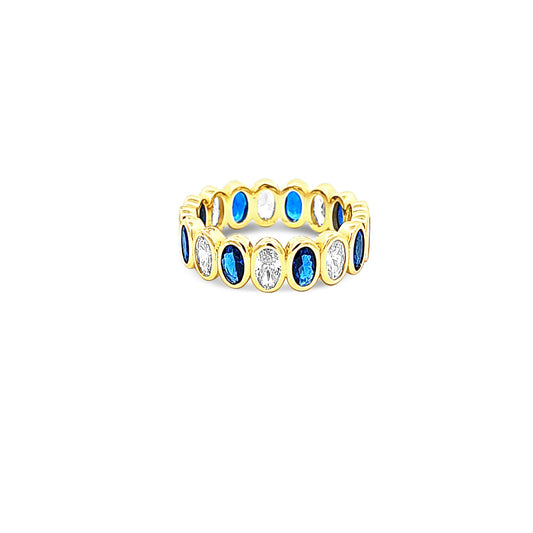 Sterling silver bezel set oval cut sapphire and cz eternity ring